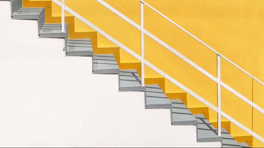 a minimalist white staircase